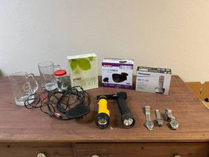 lot 717 image: Flashlights, Microphone, Watches & More