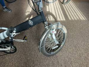 lot 17 image: NOS Black Foldable Electric Bike with Charger & Battery
