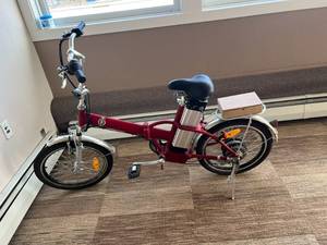 lot 18 image: NOS Foldable Electric Bike with Charger & Battery (deep red)