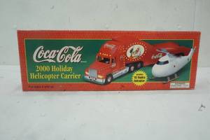 lot 79 image: CoCa Cola 2000 Holiday Helicopter Carrier