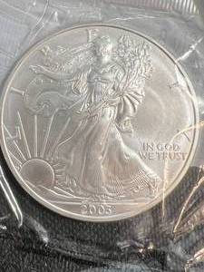 lot 45 image: 2003 AMERICAN SILVER EAGLE 1 TROY OZ .999 FINE SILVER UNC
