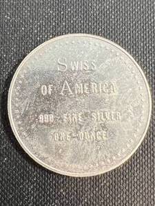 lot 80 image: 1 TROY OZ .999 FINE SILVER SWISS OF AMERICA ROUND