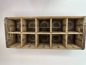 lot 24 image: Three antique seltzer bottle with wood crate