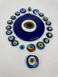 lot 86 image: 21 Glass Evil Eye Lot