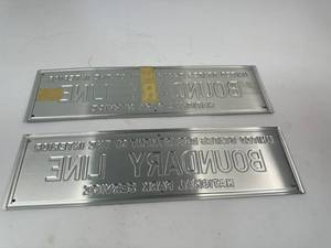 lot 92 image: Pair of United States of Interior National Park Service Boundary Line Signs