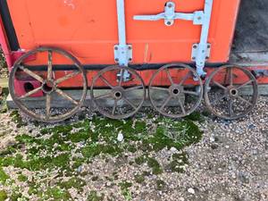 lot 48 image: Lot of 4 Various Sized Steel Wheels