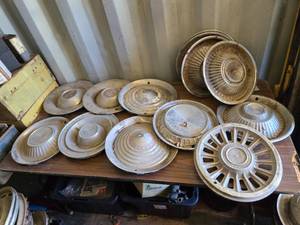 lot 63 image: Vintage Pontiac Hub Caps