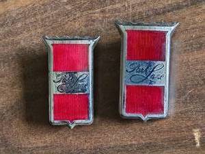 lot 114 image: Pair of 1960s Park Lane Front Fender Emblems