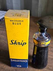 lot 260 image: 34 Full Bottle of Blue Skrip Writing Fluid