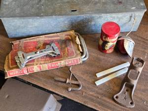 lot 306 image: Old License Plate Brackets, Flag Pole Bracket and More