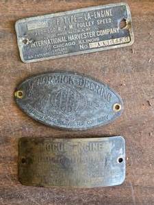 lot 332 image: International Harvester Engine Plates, Mckormick-Deering Plate,