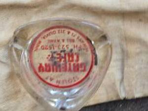 lot 379 image: Advertising Items - Pouch, Ash Tray, Crow Bars