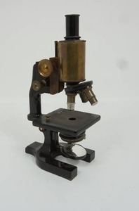 lot 36 image: ANTIQUE BAUSCH & LOMB BRASS & CAST IRON MOCROSCOPE...