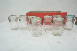 lot 54 image: 8 Vintage Bale Lock Ball Jars with Tops