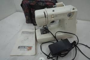 lot 136 image: Sewing, Janome Jem Gold Sewing Machine & Carrying Bag
