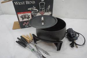 lot 143 image: West Bend Fondue Pot