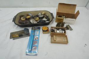 lot 176 image: Vintage pan and wheel parts, sewing machine attachments and other items