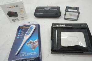 lot 203 image: Wallet, Thermometer, Oximeter and more