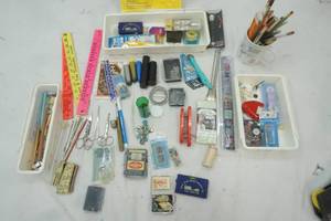 lot 234 image: Variety of Sewing accessories, Needles, Buttons, Ruler, scissors, Mug with pens and pencils and more