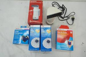 lot 254 image: Health & Beauty HotCold Packs, two Ice bags and Franzus Travel Clothes Steamer