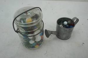 lot 281 image: Glass Jar and Small Tin Cup with Marbles