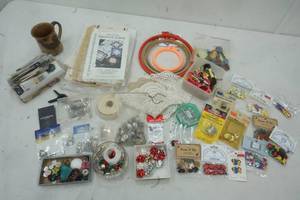 lot 287 image: Cross Stitching, sewing , and large Variety of buttons, thimbles, doilies and more