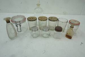 lot 290 image: Vintage perfume bottles & Keri Jars with some covers, two small glass round jars