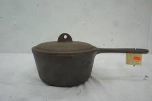 lot 303 image: Cast Iron cooking pot with cover