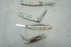 lot 392 image: Four pocket knives