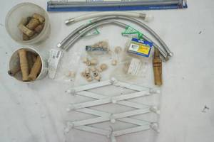 lot 502 image: Faucet Parts, Little Wood pieces, corks and more