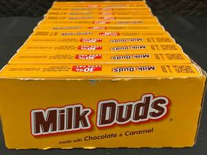 lot 38 image: Milk Duds Box of 12