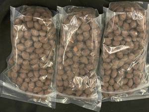 lot 129 image: Dark Chocolate Covered Almonds 3 X 1 LB bags