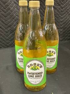 lot 269 image: Roses Sweetened Lime Juice 3 Large 1 Liter Bottles