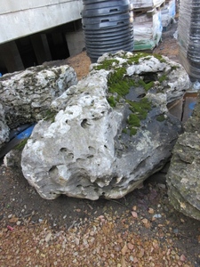 lot 707 image: WEATHERED LIMESTONE BOULDER
