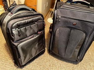 lot 55 image: Two Cloth Sided Rolling Suitcases