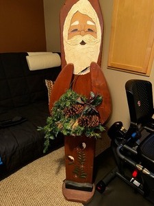 lot 56 image: Wood Outdoor Standing Santa Claus Measuring 58 Tall