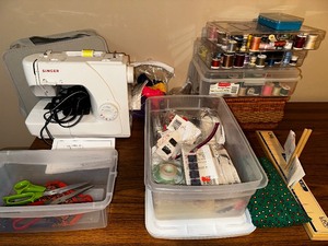 lot 98 image: Lot of Sewing Supplies and Singer Sewing Machine