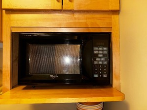 lot 100 image: Whirlpool 0.7 cu FT Microwave Oven