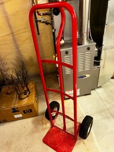 lot 106 image: Red Two Wheel Stand Up Dolly