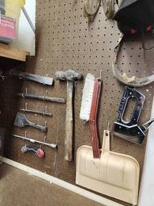 lot 74 image: Wall of Assorted tools, Hammers, Concrete Chisels, ETC.