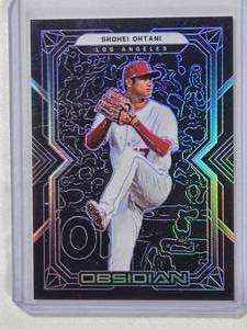 lot 56 image: Shohei Ohtani 2022 Panini Chronicles Obisdian No. 28 - Numbered 599