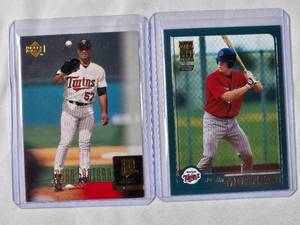 lot 121 image: Lot of 2 Rookie Cards Johan Santana 2000 Upper Deck No. 11 & Justin Morneau 2001 Topps T235