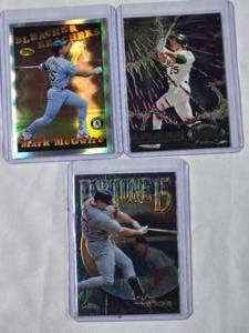 lot 151 image: Lot of 3 Mark McGwire Inserts 1999 Topps Fortune 15 No. FF12, 1997 Topps Bleacher Reachers No. SB6, 1997 Fleer Metal Universe No. 131