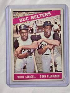 lot 176 image: 1966 Buc Belters Willie Stargell & Don Clendenon Topps No. 99 Vintage Baseball Card