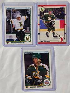 lot 297 image: Lot of 3 Mike Modano Rookie Cards - 1990 Upper Deck No. 346, 1990 Score No. 120, 1990 Upper Deck No. 46