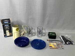 lot 26 image: Electric Mincer (untested), Food Storage Lids, Blue Plastic Bowls, 2 Sets of Coasters, Safe Harbor Beer Glasses, Disposable Utensils