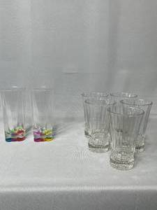 lot 27 image: Decorative Glasses - 5 Glass, 2 Iridescent Base Plastic Glasses