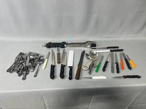 lot 32 image: Cutlery, Utensils, Grill Tongs and a Large Variety of Knives