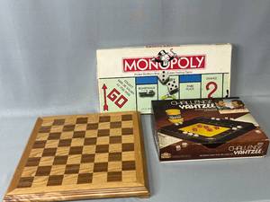 lot 35 image: Monopoly, VTG Challenge Yahtzee and Wooden Chess Set (pieces on back)