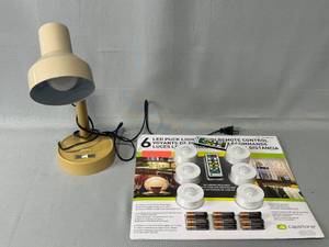 lot 43 image: Puck Lights in PKG (set of 6) and VTG Desk Lamp (untested)